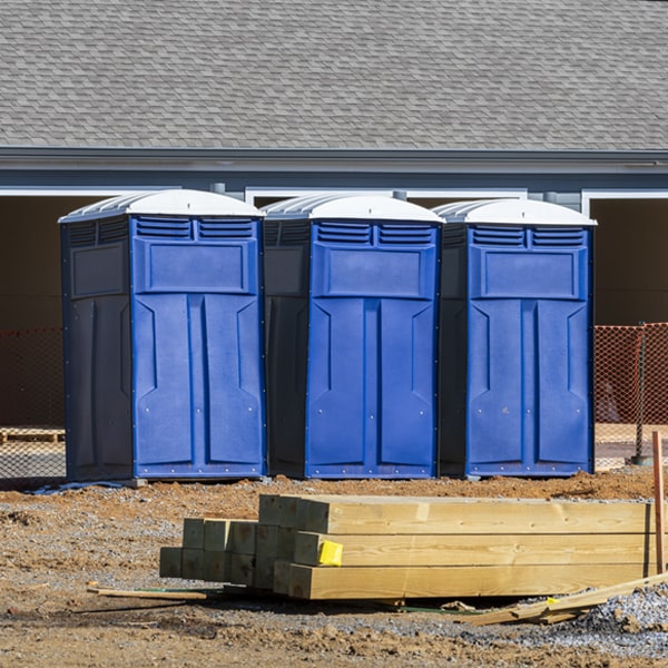 what is the cost difference between standard and deluxe porta potty rentals in Decorah Iowa